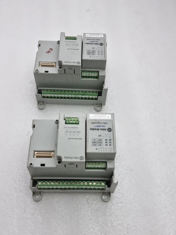 LOT OF 2PCS ALLEN BRADLEY 2080-LC20-20QBB Micro820 With 2080-SERIALISOL MODULE